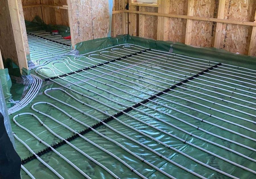 Underfloor heating loops paired with a heat pump